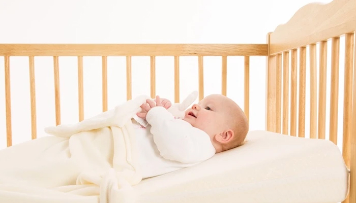 how to elevate bassinet for reflux
